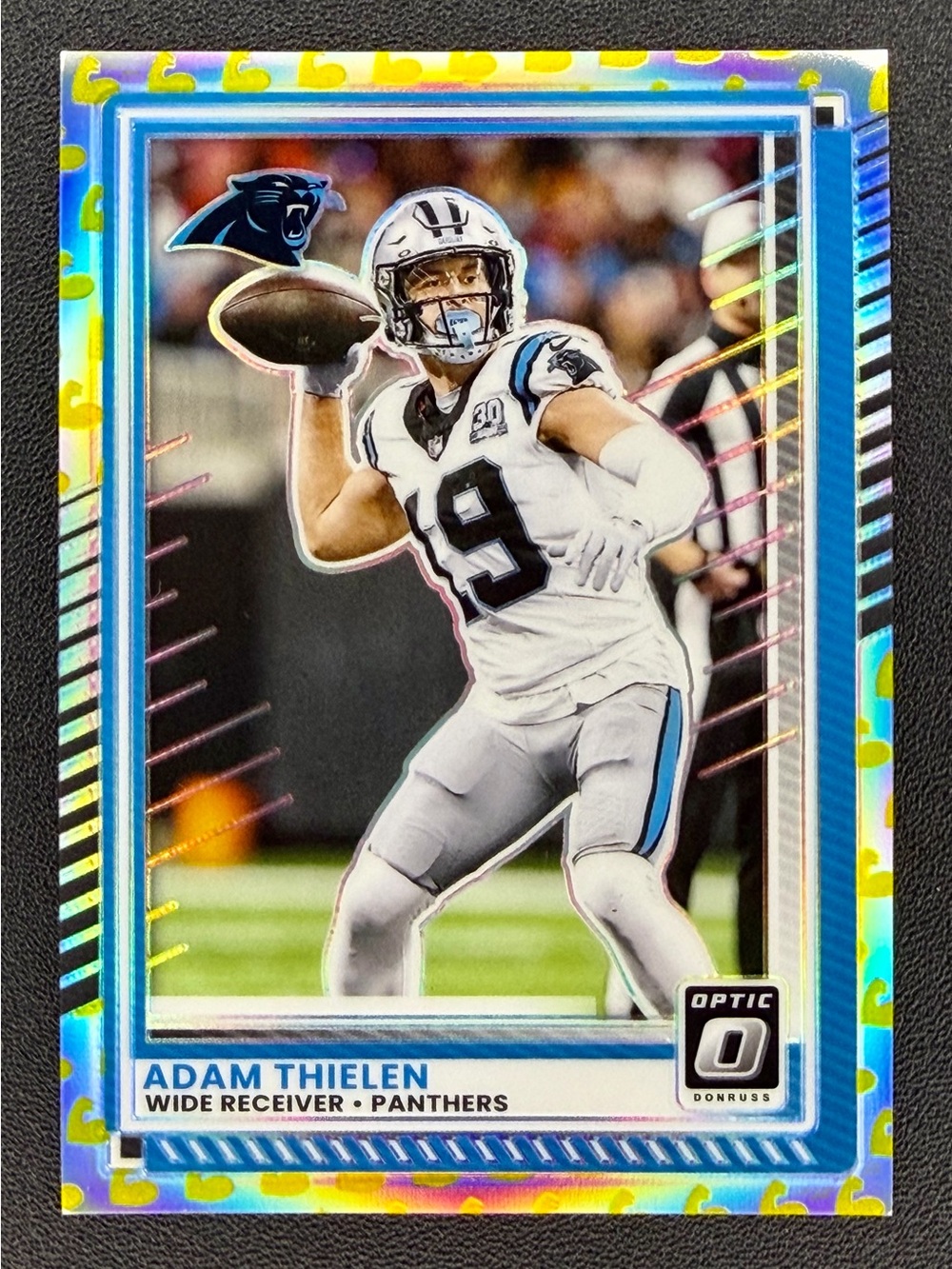 2025 Panini Donruss Optic Adam Thielen Flex Logo Boarder Prizm #/199 Panthers